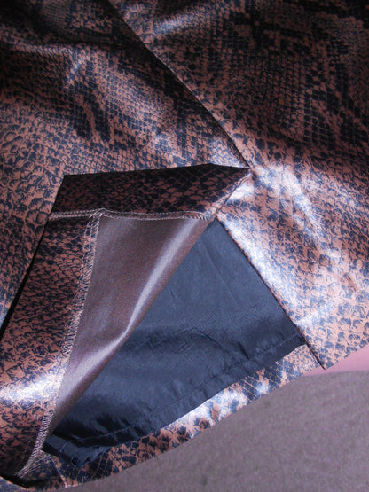 YVES SAINT LAURENT VARIATION 1990S SATIN SNAKE SKIRT